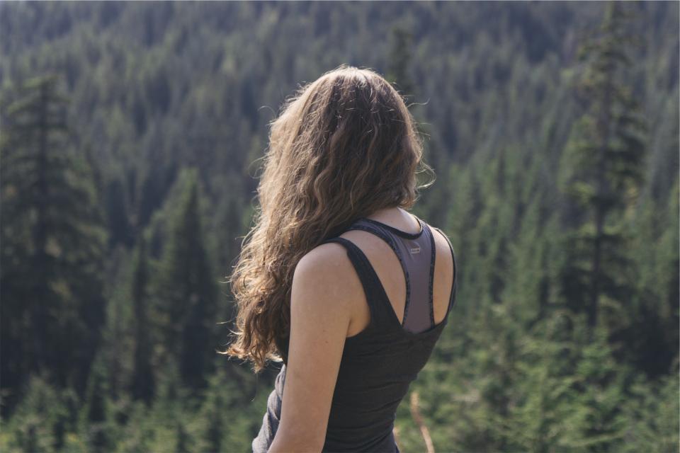 woman trees tanktop outdoors nature longhair hiking girl fitness curls brunette 