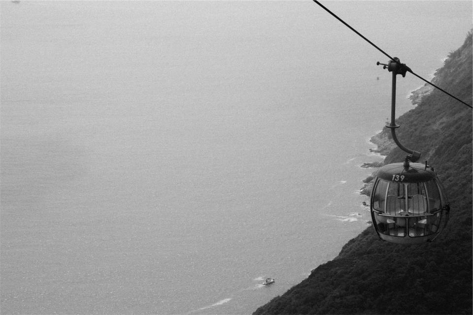 gondola, lift, mountains, coast, water, ocean, sea, boats, black and white, aerial, view