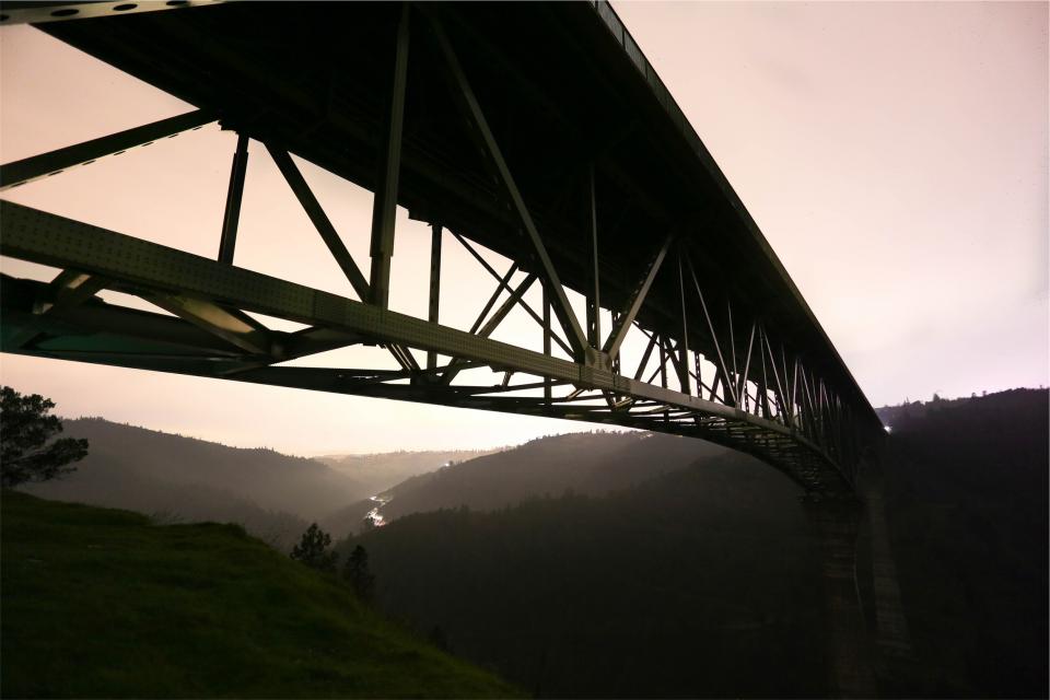 bridge, sunset, architecture, hills, trees, dusk