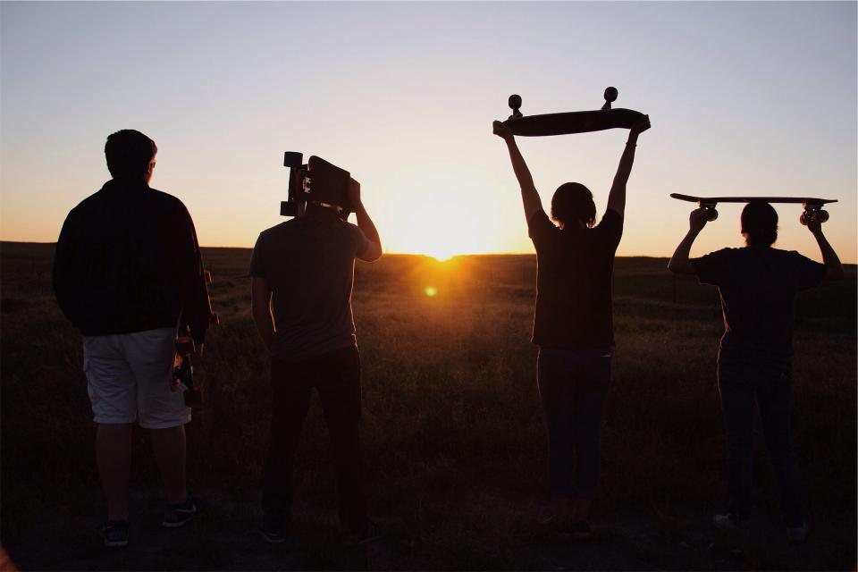 sunset, skaters, skateboards, skateboarding, people, young, guys, boys, silhouette, shadows, dusk