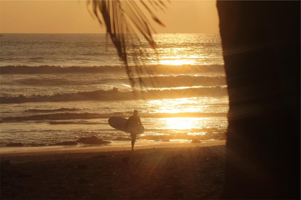 waves water surfer surfboard sunset sea sand ocean beach 