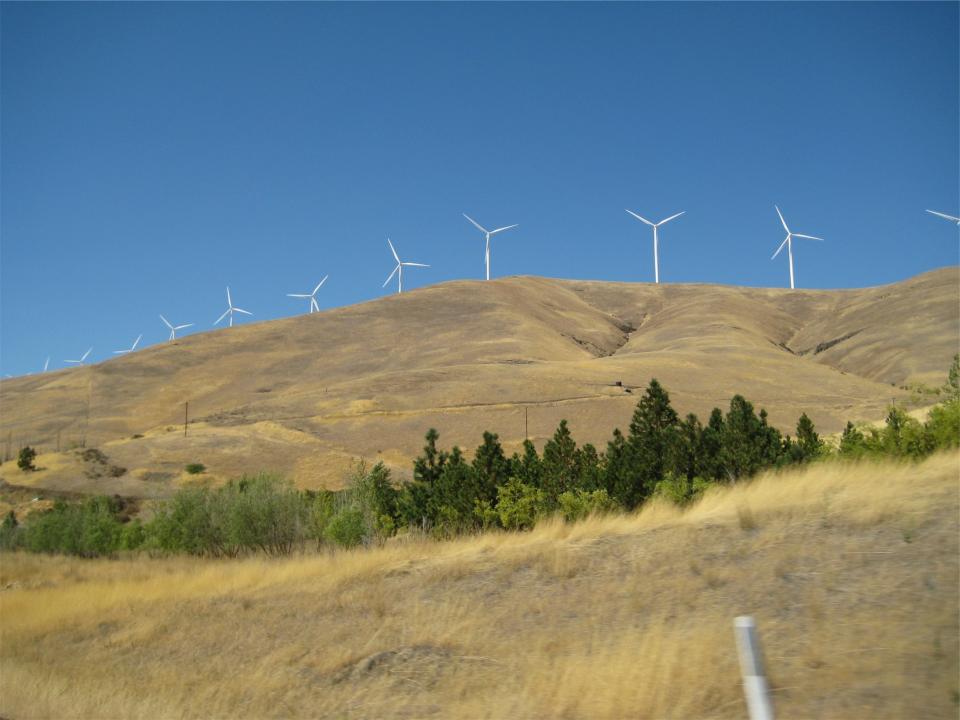 windmills sky rural hills fields blue 