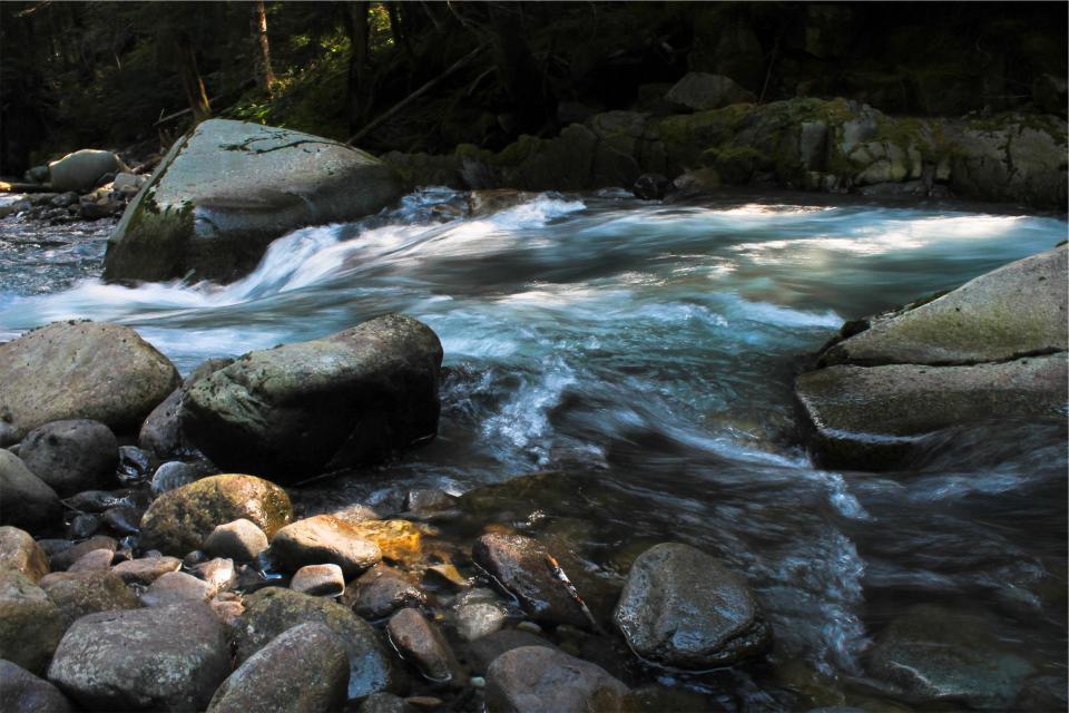 water stream rocks river nature boulders 