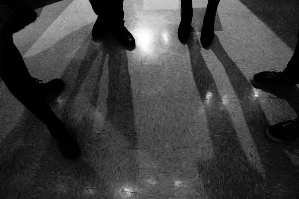 tiles shoes shadows pants floors 