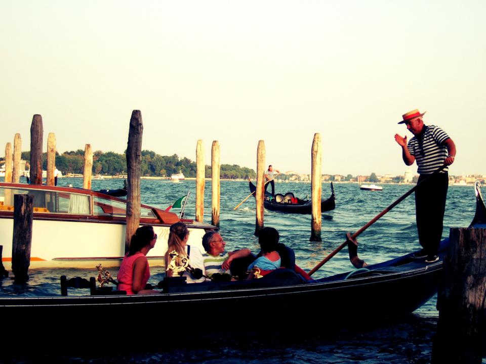 water Venice sea rowing people oar man Italy hat gondolas boats 