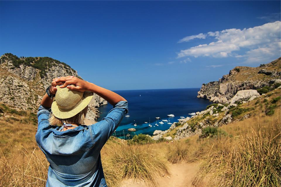 girl, woman, hat, denim, shirt, fashion, blue, sky, ocean, sea, water, boats, docks, harbor, harbour, rocks, cliffs, coast, people