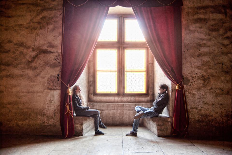 guy, girl, people, sitting, talking, conversation, window, sunlight, curtains, drapes, concrete, walls