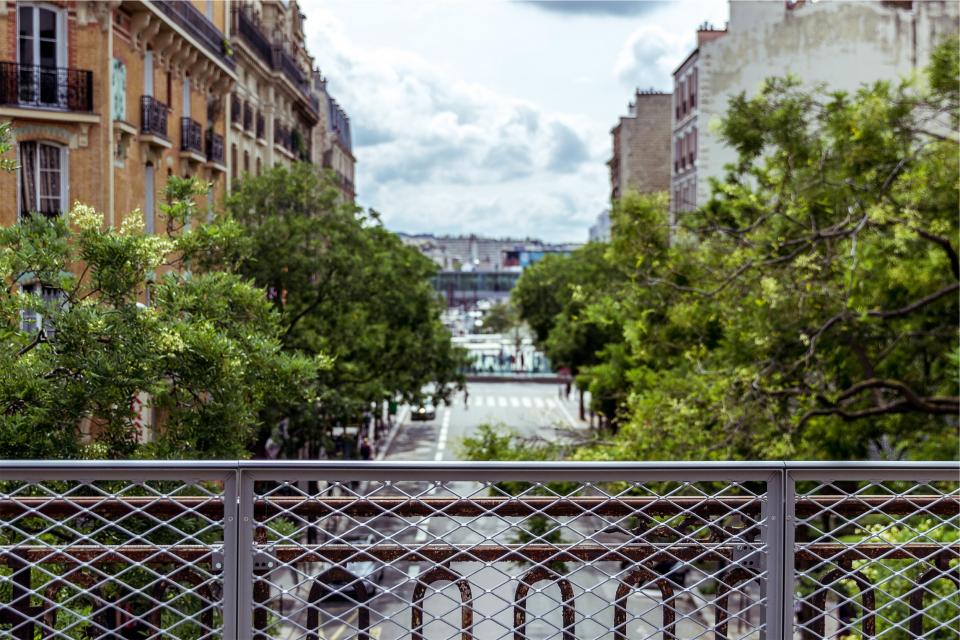 chainlink, fence, overpass, road, street, trees, city, buildings