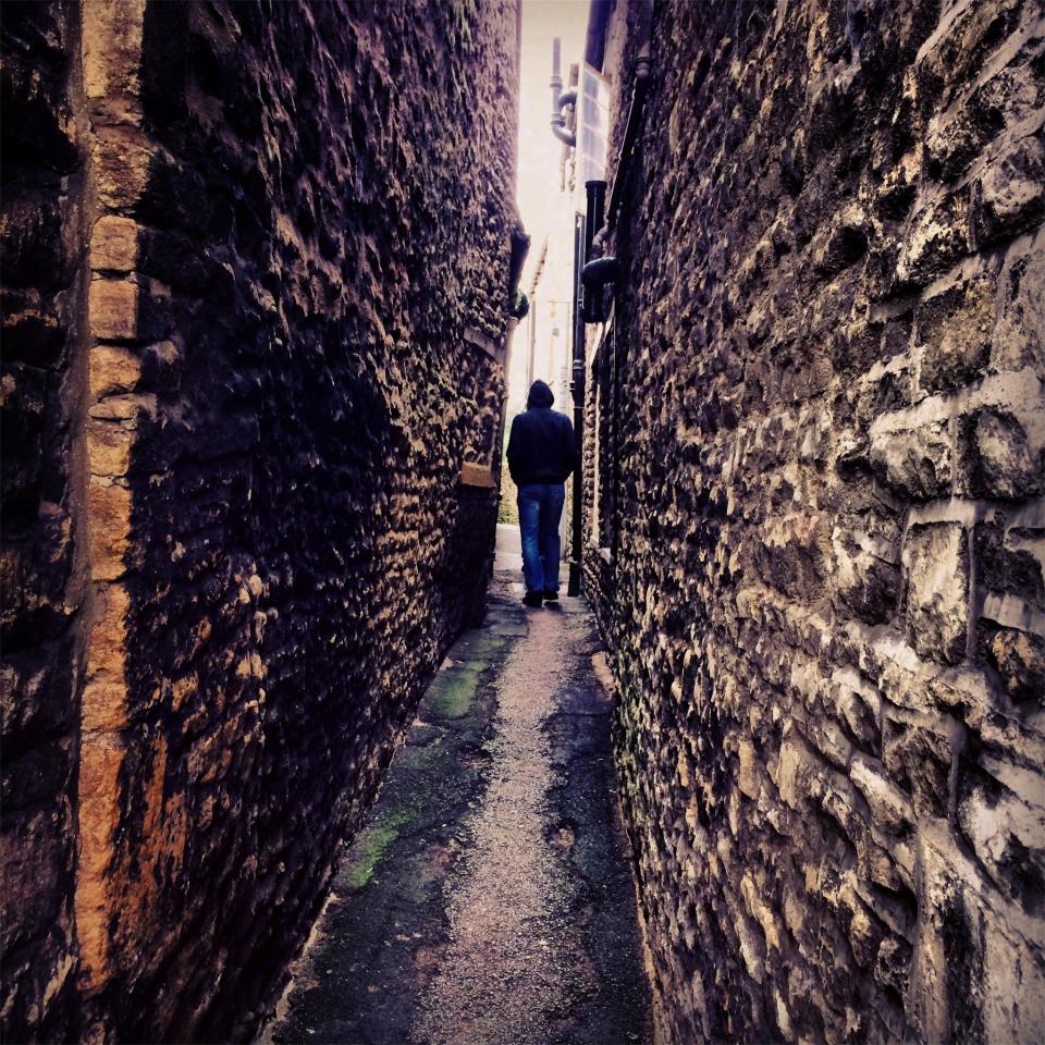 alley, stones, walls, pavement, guy, man, hoodie, people