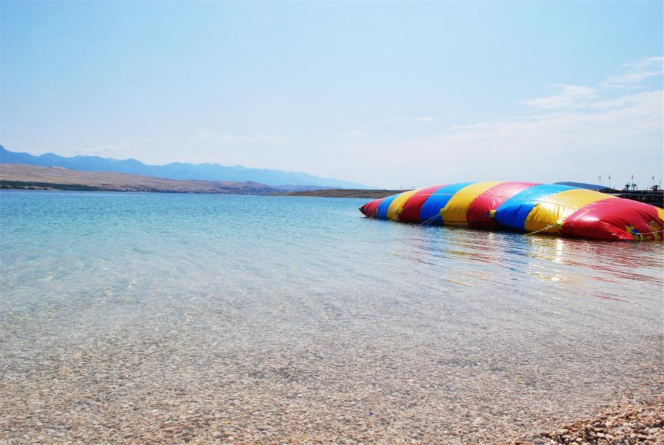 water sunshine summer shore rocks inflatablebouncer beach 