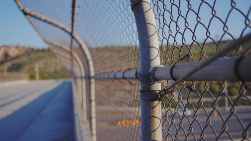 road overpass fence chainlink 