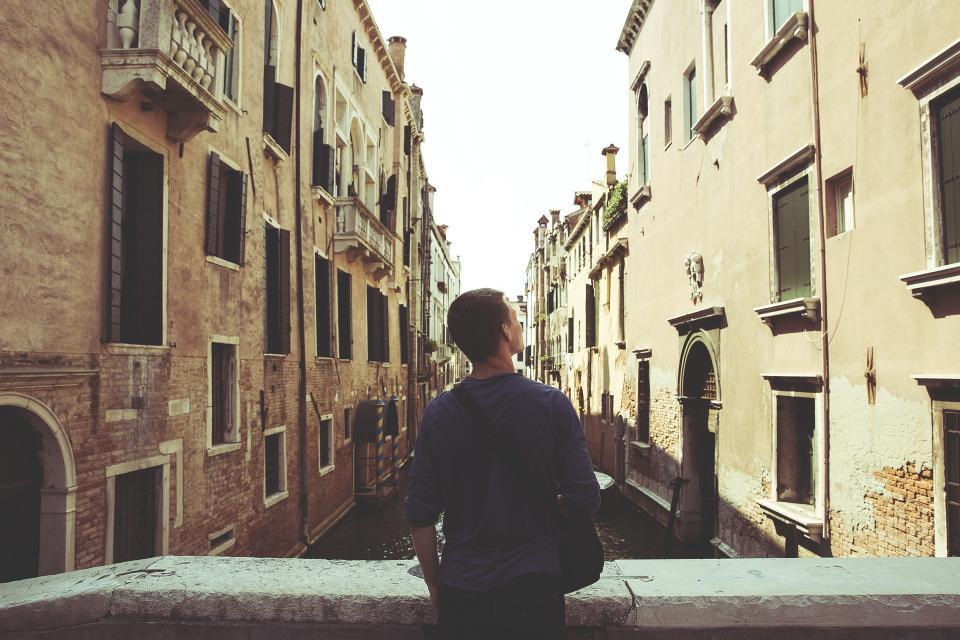 young water Venice sweater people man jeans Italy houses guy city Bridge bag architecture apartments 