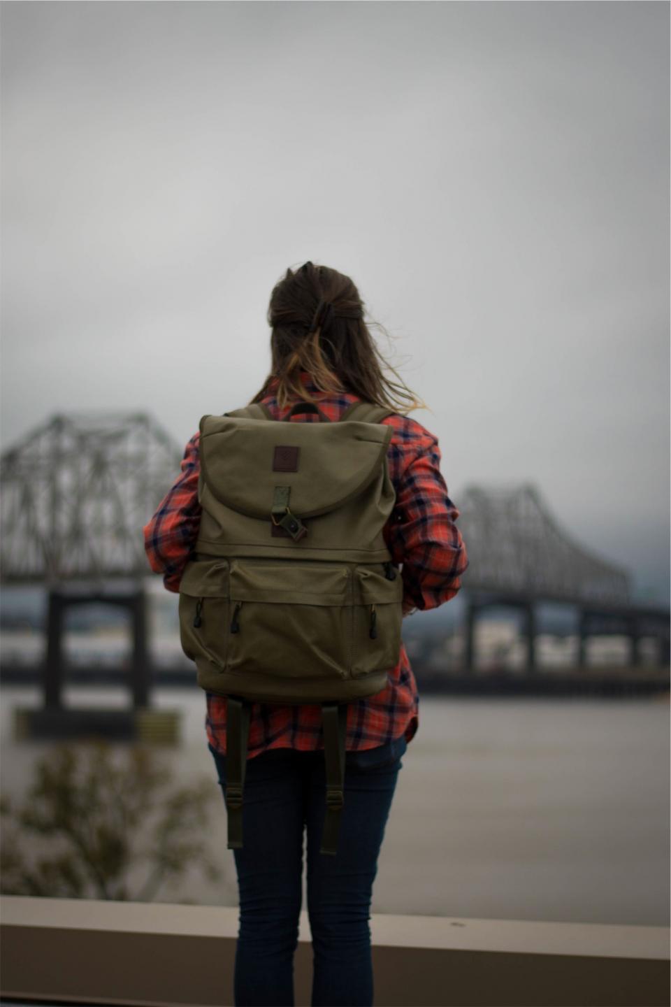young woman shirt plaid people longhair knapsack jeans girl denim brunette Bridge backpack architecture 