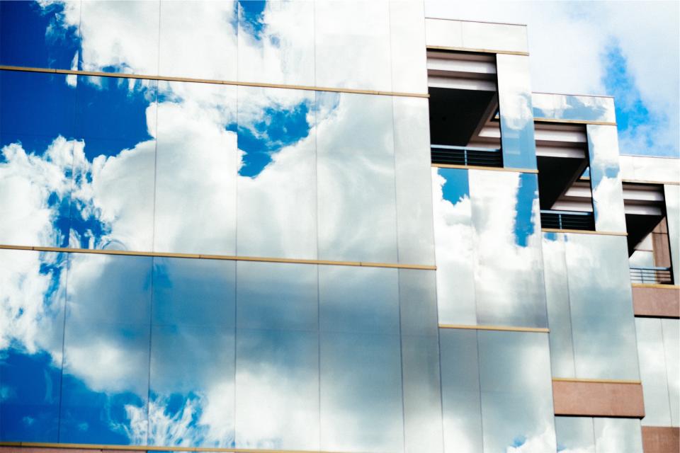 Windows sky reflection clouds building architecture 