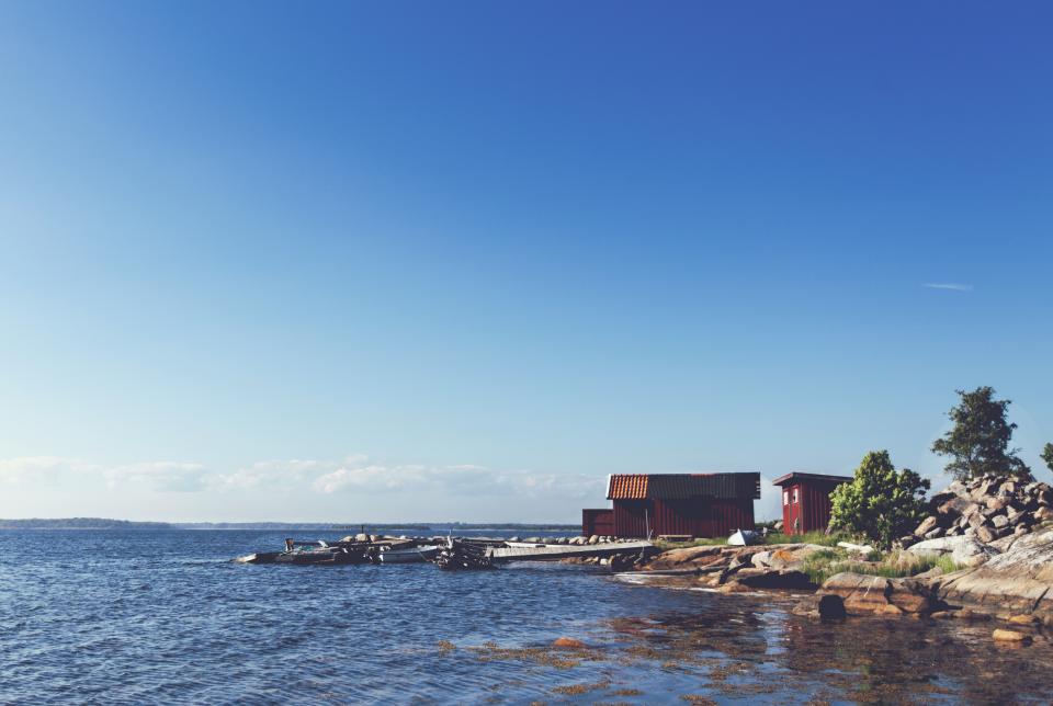 lake, water, docks, boats, rocks, sunshine, sunny, summer, blue, sky, cottage, shed