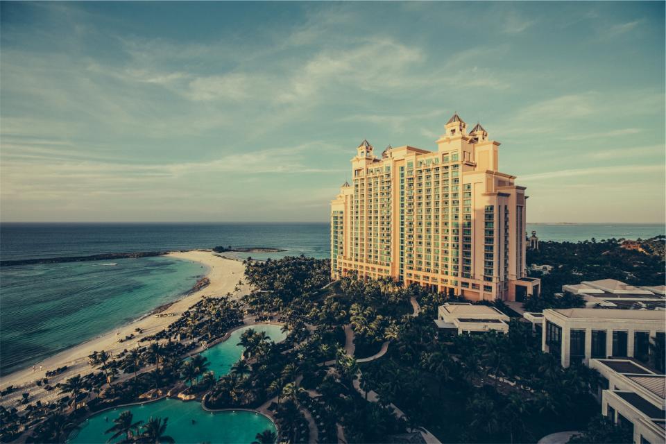 water vacation tropical sky sand resort paradise palmtrees island hotel beach Bahamas Atlantis architecture 