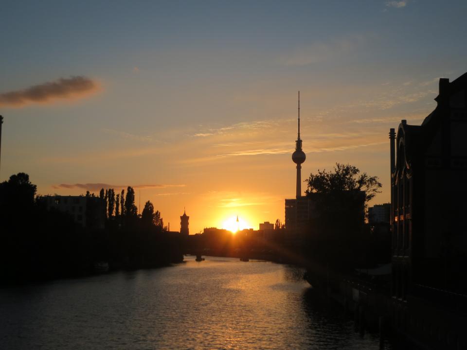 water tower sunset sky shadows night germany dusk dark city canal Berlin 