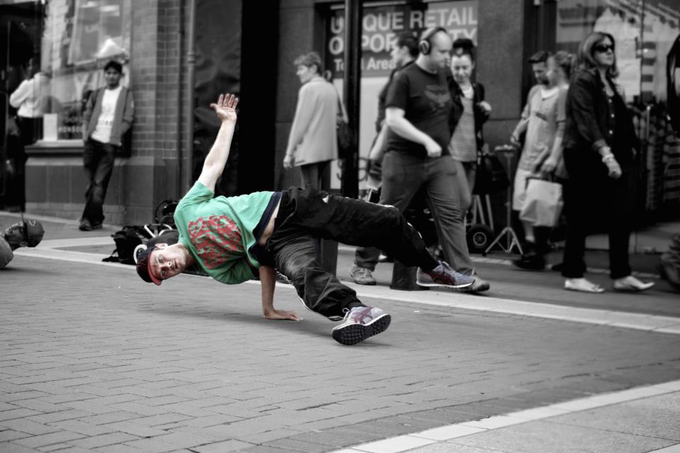 young urban street people pedestrians guy city breakdancing breakdancers 
