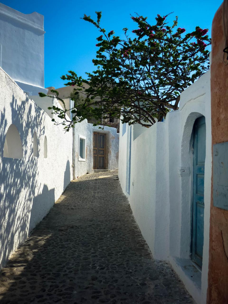 walkway Santorini path Oia greece doors cobblestone 