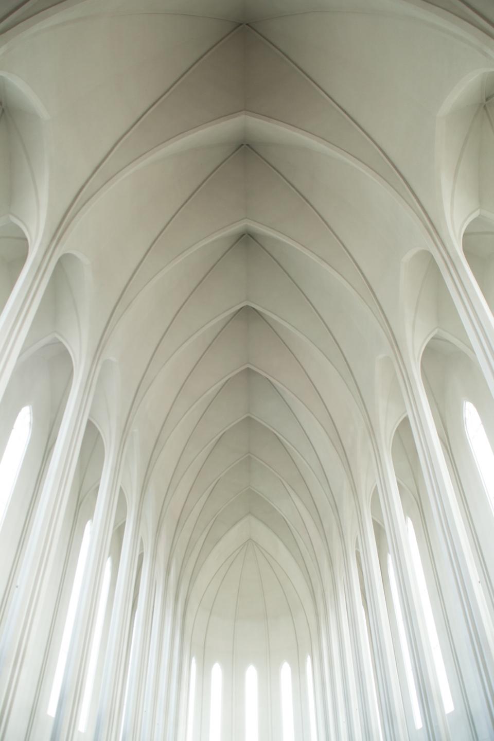 white sunlight church ceiling arches 