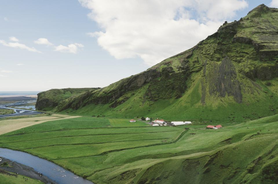 water valleys stream nature mountains lake iceland hills green grass fields farm country 