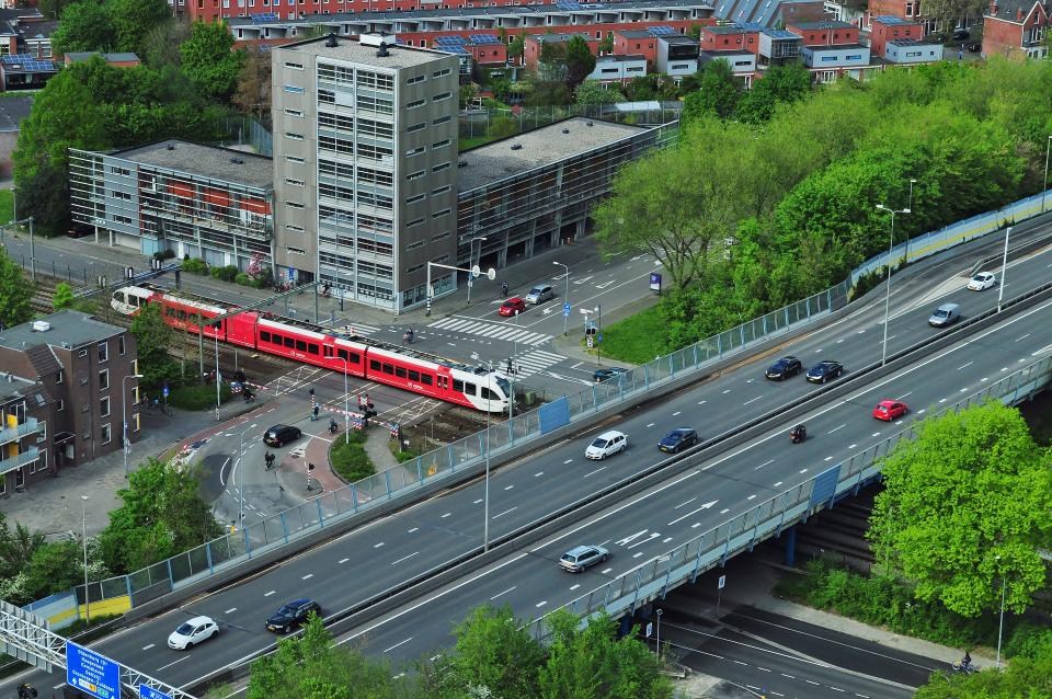 highway, road, city, train, transportation, cars, trucks, buildings, overpass