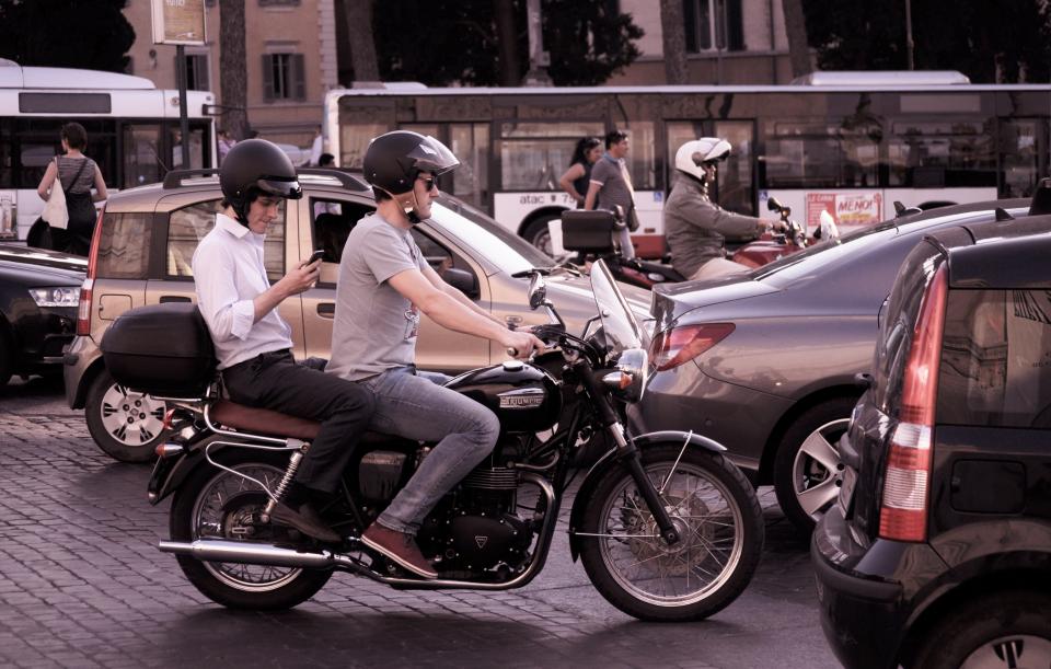 urban traffic streets roads motorcycle motorbike helmets city cars 