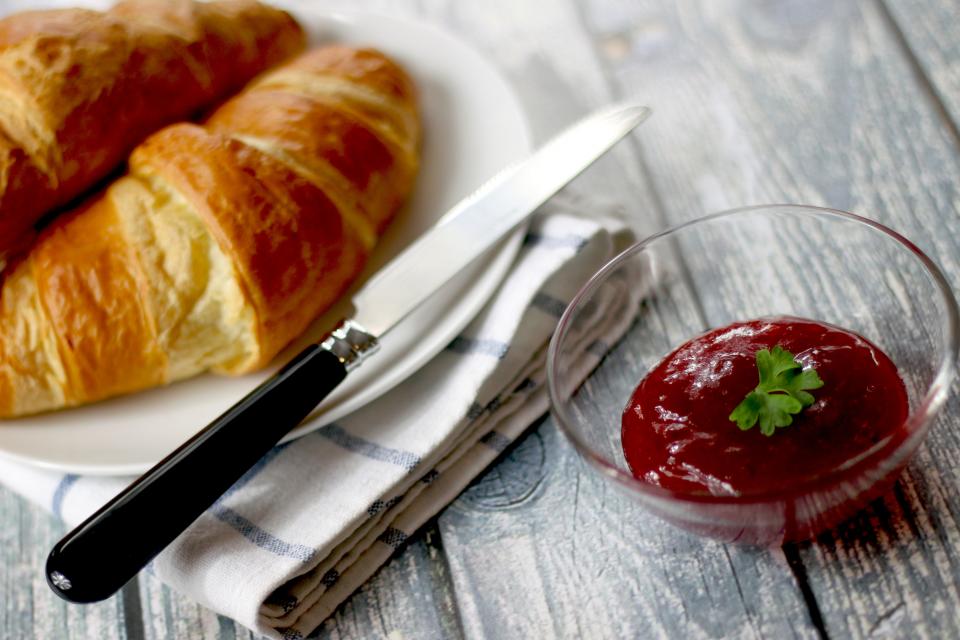 table pastry pastries knife jam food croissants breakfast bowl 