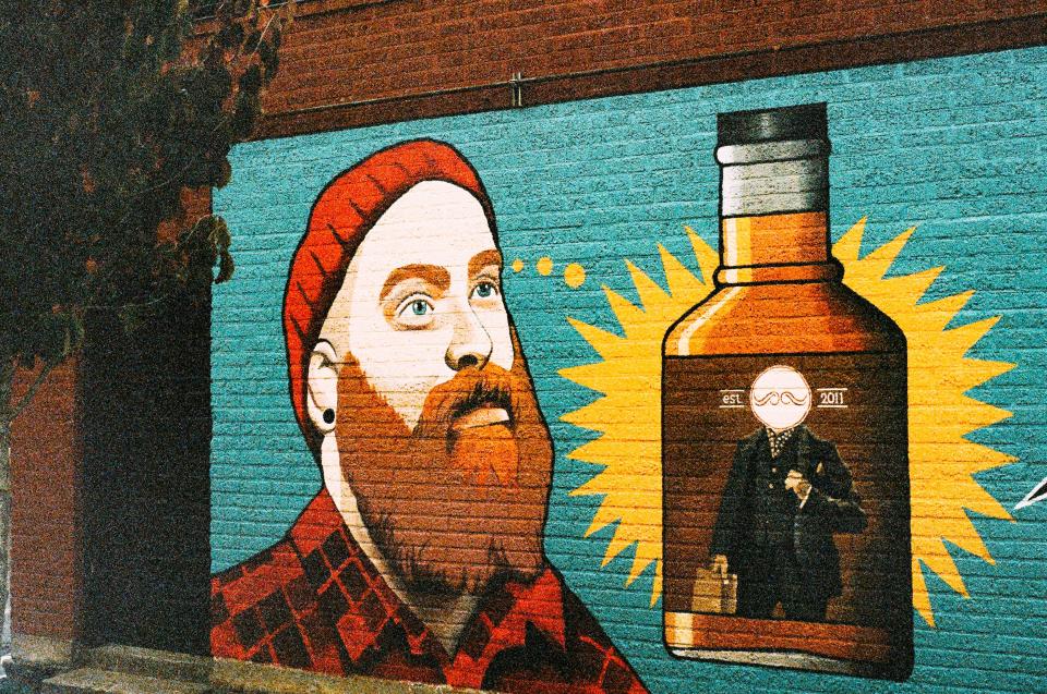 whiskey wall toque plaid paint orange man hipster hat graffiti booze beard alcohol 