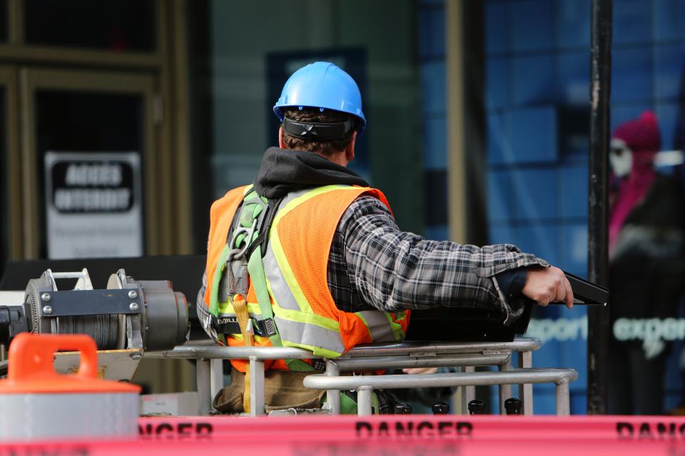 zone worker vest tape signs hardhat danger construction 