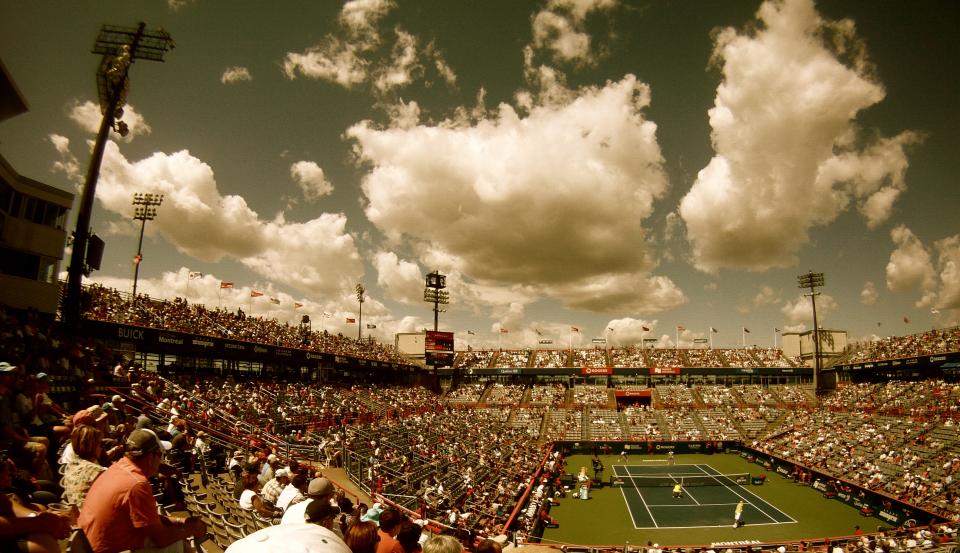 tennis stadium sports spectators sky rogerscentre net flags crowd court clouds athletes 