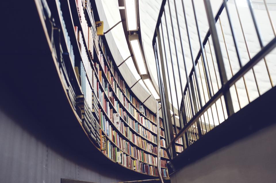 shelves railing lights library building books architecture 