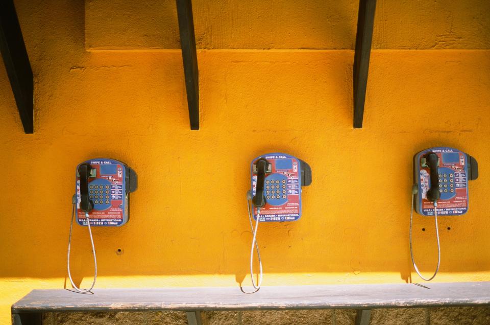 yellow wall telephones payphones collectcall 