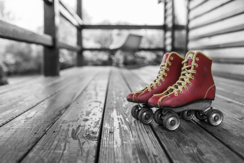 wood wheels rollerskates red porch laces deck 