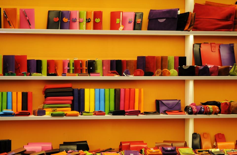 wallets store shop shelves notepads merchandise colors cases 