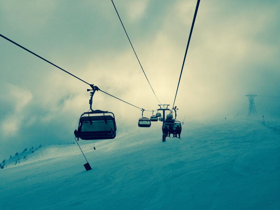 sky, clouds, mountains, winter, cold, snow, ski, snowboard, sports, chairlift, wire, power lines, flag