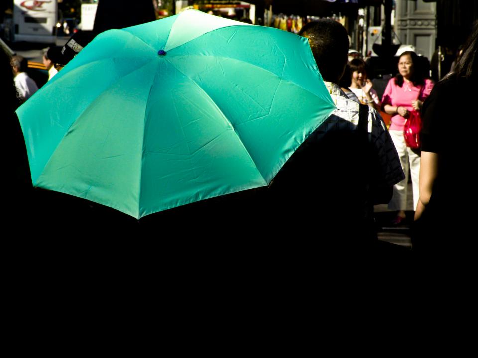 umbrella people pedestrians green crowd 
