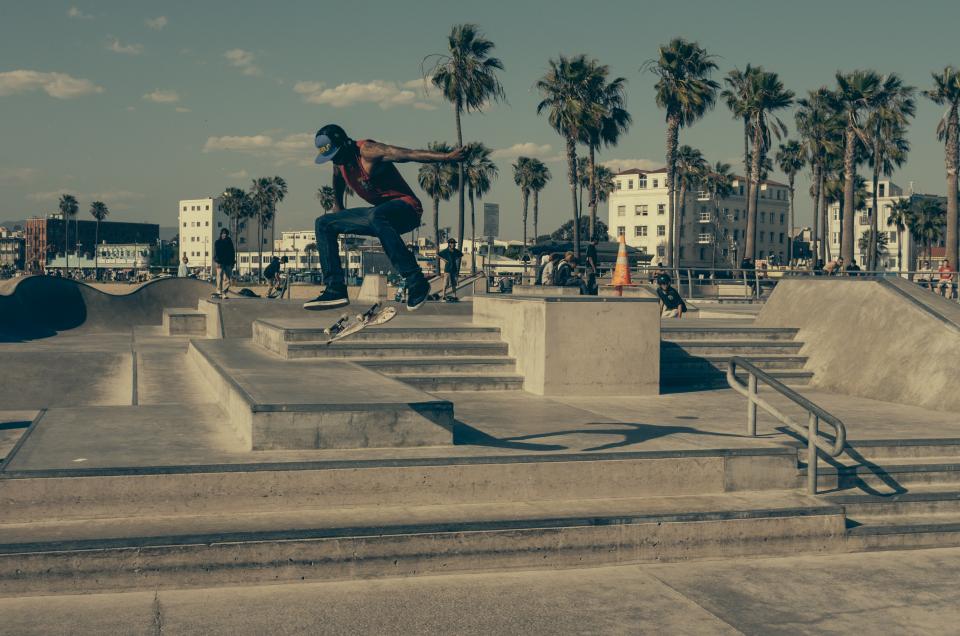 skater, skateboard, skate park, steps, railing, sunny, palmtrees, pylon, tricks, kickflip, jump, kid, boy, ramp, concrete, street
