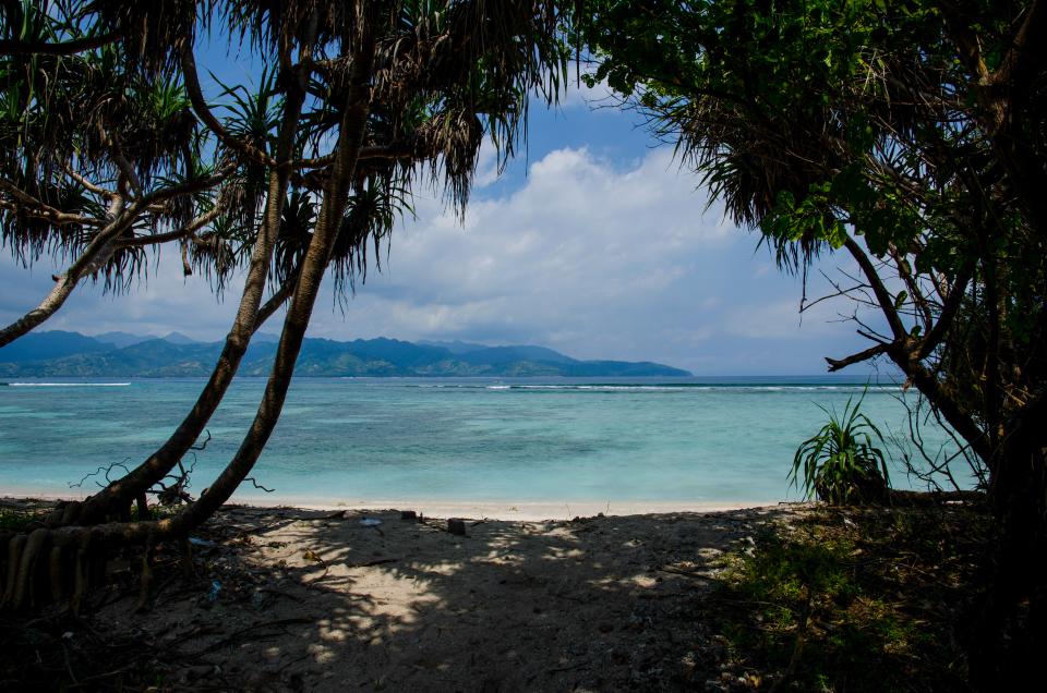 beach, sand, tropical, sea, ocean, water, vacation, trees, mountains, sky, clouds