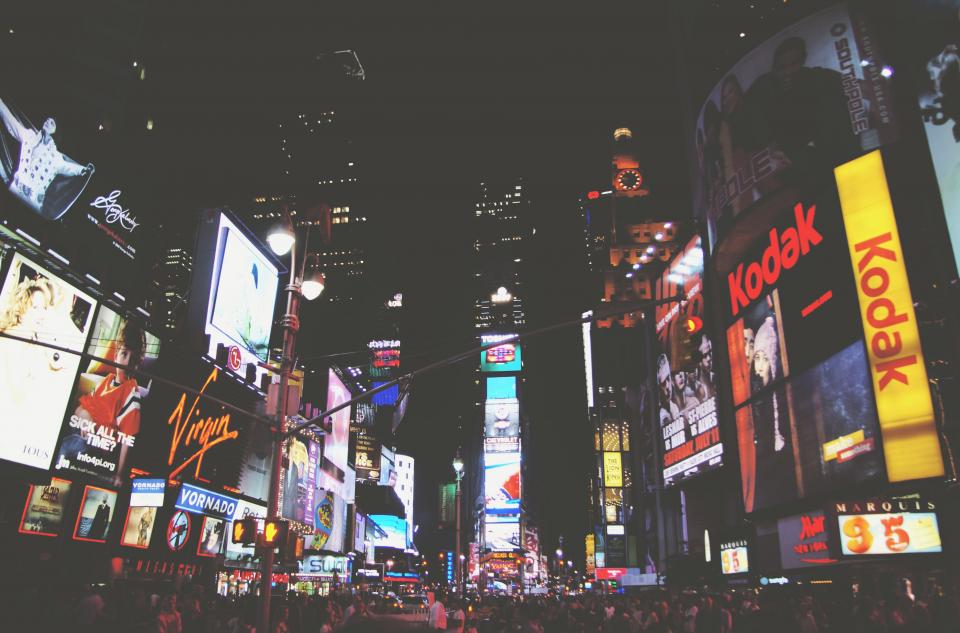 towers timessquare signs people night NewYork lights evening dark crowd city busy buildings billboards ads 