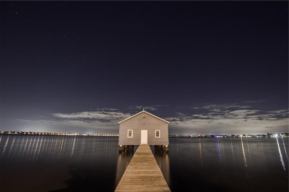wood water sky night lights house dock dark 