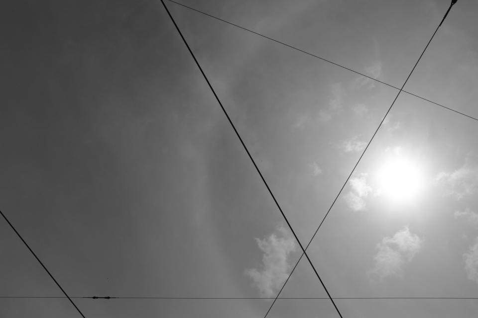 sun sky lines clouds cables 