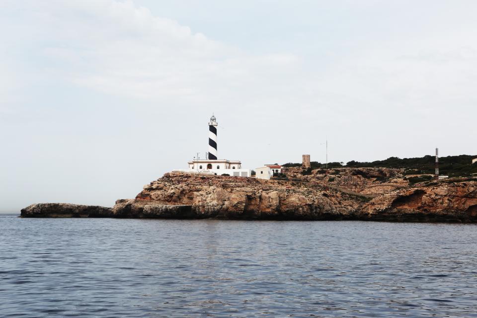 water sea rocks lighthouse coast 