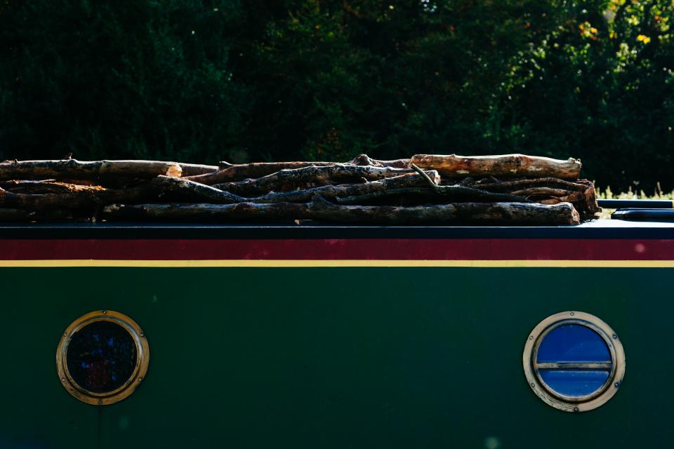wood Windows lumber logs boat 
