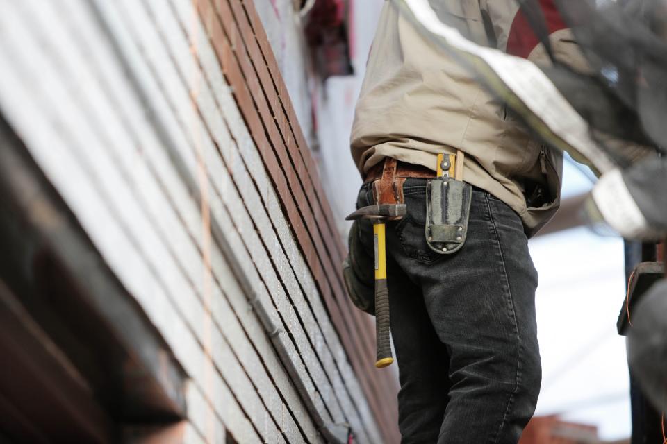 worker tools knife jeans hammer construction builder 