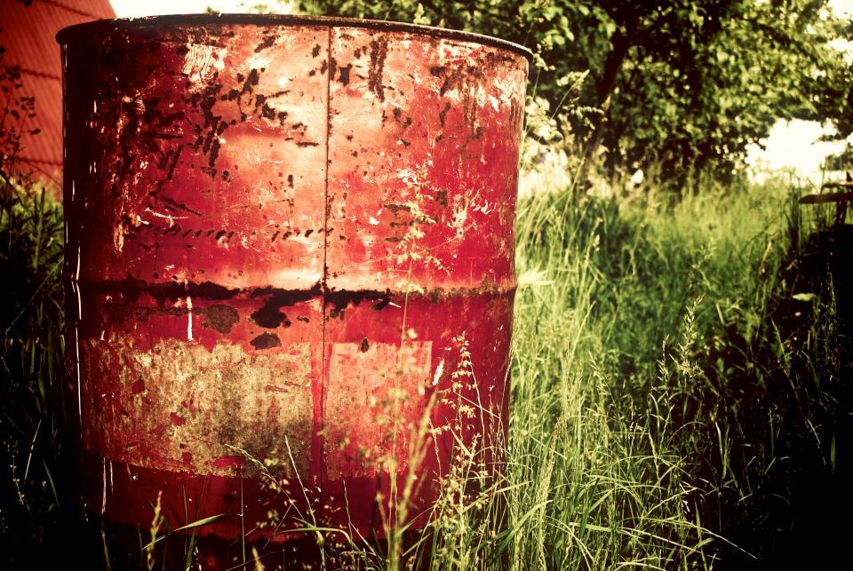 wheat trees trashcan rust red green grass garbagecan farm barrel 