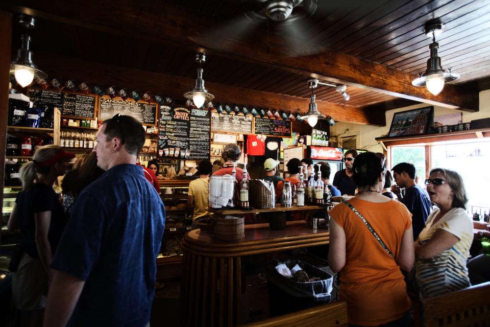 woman signs people order menus man coffeeshop caffe bar 
