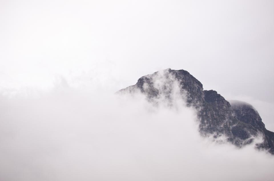 sky peaks mountains fog clouds cliffs 
