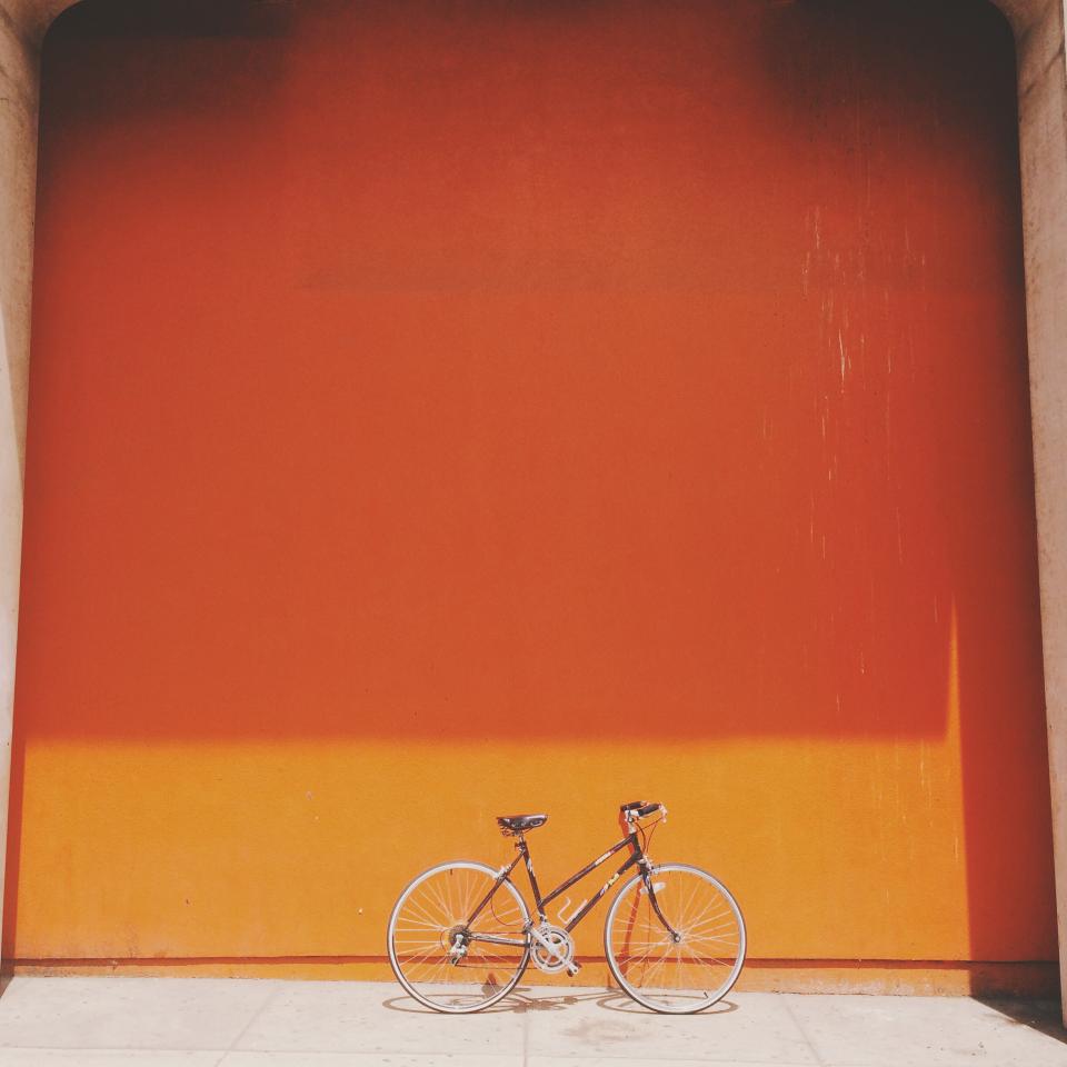 wall orange bike bicycle 