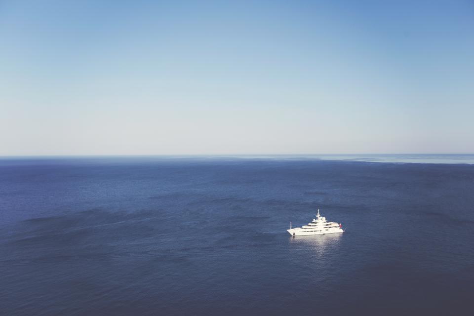 yacht water sky sea ocean clear boat blue 